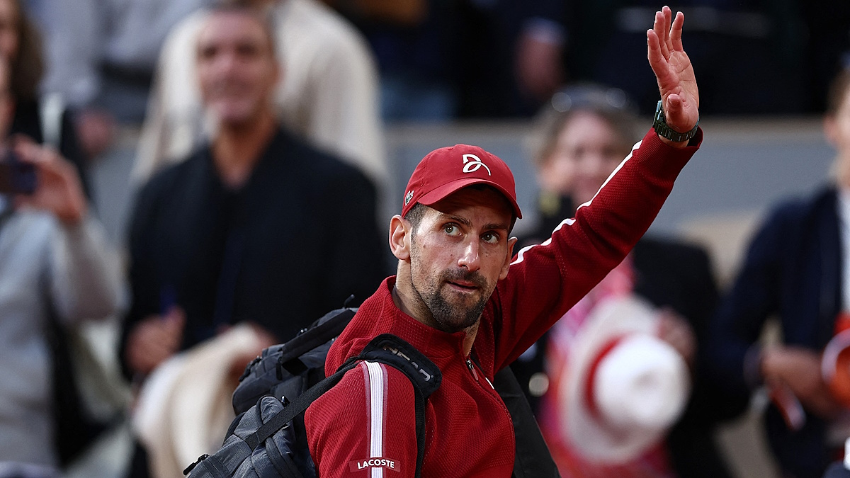 Tennis - French Open - Roland Garros, Paris, France - June 3, 2024 Serbia's Novak Djokovic waves to fans as he leaves the court after winning his fourth round match against Argentina's Francisco Cerundolo REUTERS/Stephanie Lecocq